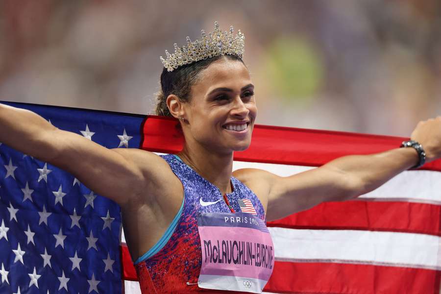 USA's Sidney McLaughlin-Levrone celebrates winning the 400m hurdles and breaking the world record at the Olympic Games in Paris, 2024