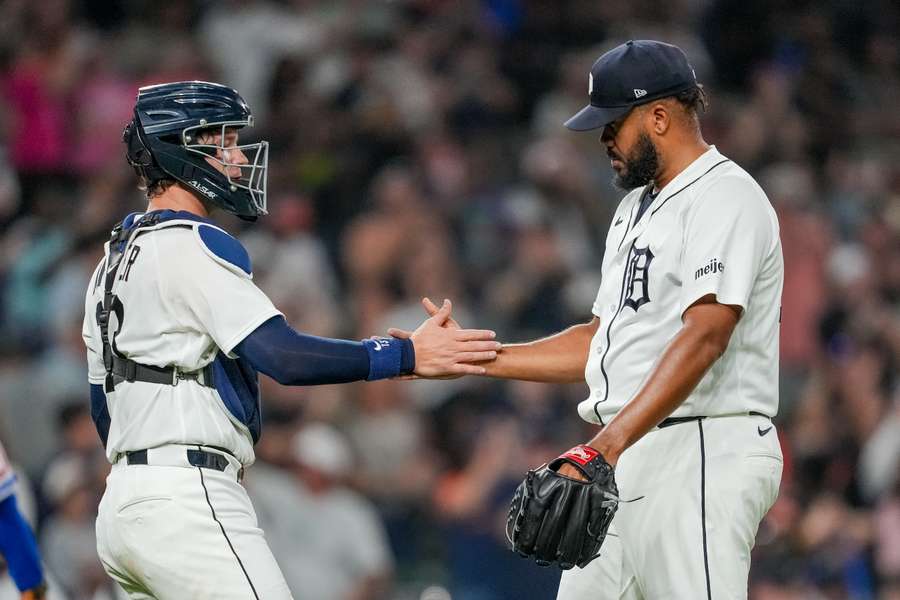 Kenley Jansen (left) celebrates 479th save with catcher Dillon Dingler Kenley Jansen (left) celebrates 479th save with catcher Dillon Dingler