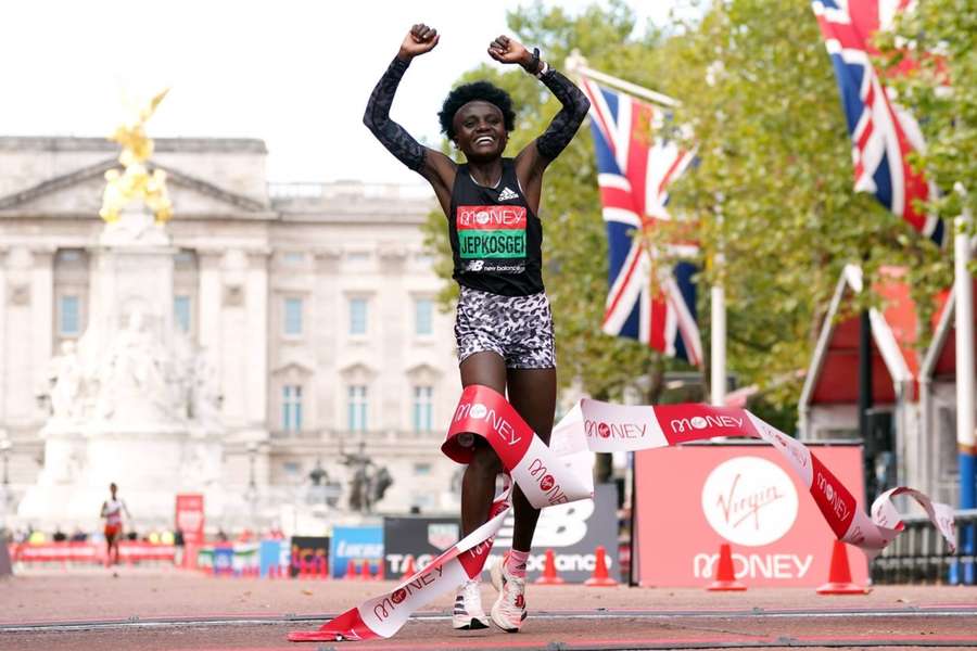 Joyciline Jepkosgei crosses the line to win the women's elite race at the 2021 London Marathon