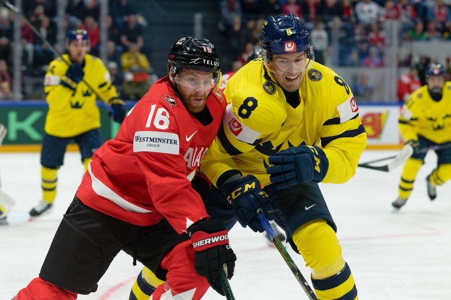 Canada's Connor Brown and Robert Hagg of Sweden mid-duel