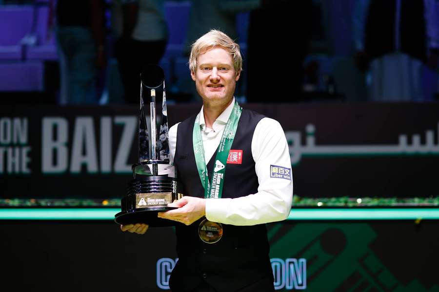 Neil Robertson poses with championship trophy after winning the final against Ronnie O Sullivan Neil Robertson poses with championship trophy after winning the final against Ronnie O Sullivan
