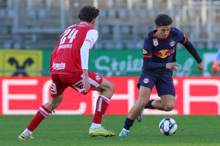 Red Bull Salzburg's Clement Bischoff in action against GAK's Tim Paumgartner Red Bull Salzburg's Clement Bischoff in action against GAK's Tim Paumgartner