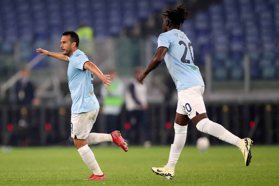 Pedro (left) celebrates his late equaliser against Parma