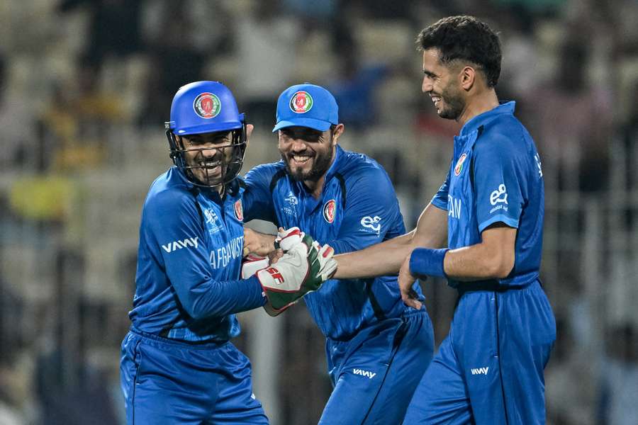 Afghanistan's Abdollah Ahmadzai (right) celebrates with teammates after taking a catch to dismiss Canada's Dilon Heyliger Afghanistan's Abdollah Ahmadzai (right) celebrates with teammates after taking a catch to dismiss Canada's Dilon Heyliger
