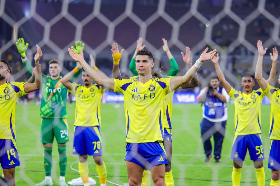 Cristiano Ronaldo and his Al-Nassr teammates at the end of the AFC Champions League Elite Quarter Finals match against Yokohama F. Marinos Cristiano Ronaldo and his Al-Nassr teammates at the end of the AFC Champions League Elite Quarter Finals match against Yokohama F. Marinos
