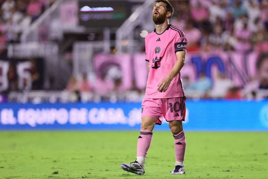 Lionel Messi looks dejected during his side's loss to Atlanta