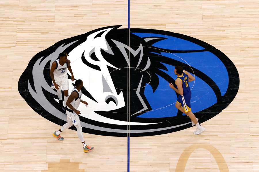 Dallas Mavericks logo on their home court