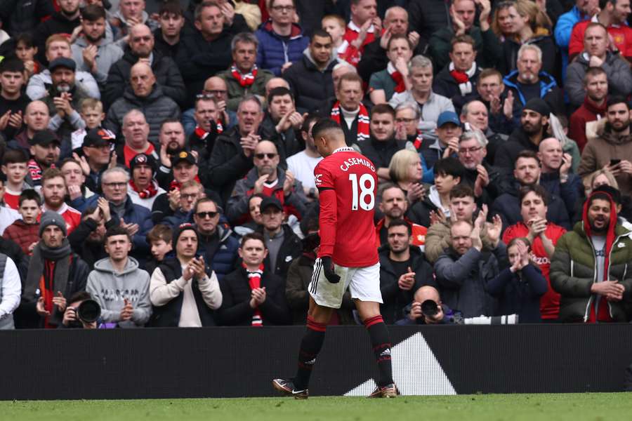 Manchester United's Brazilian midfielder Casemiro walks off after being shown a red card