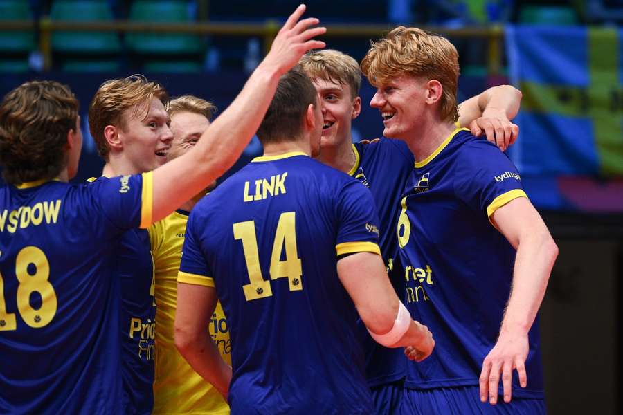 Sweden players celebrate beating Slovakia Sweden players celebrate beating Slovakia