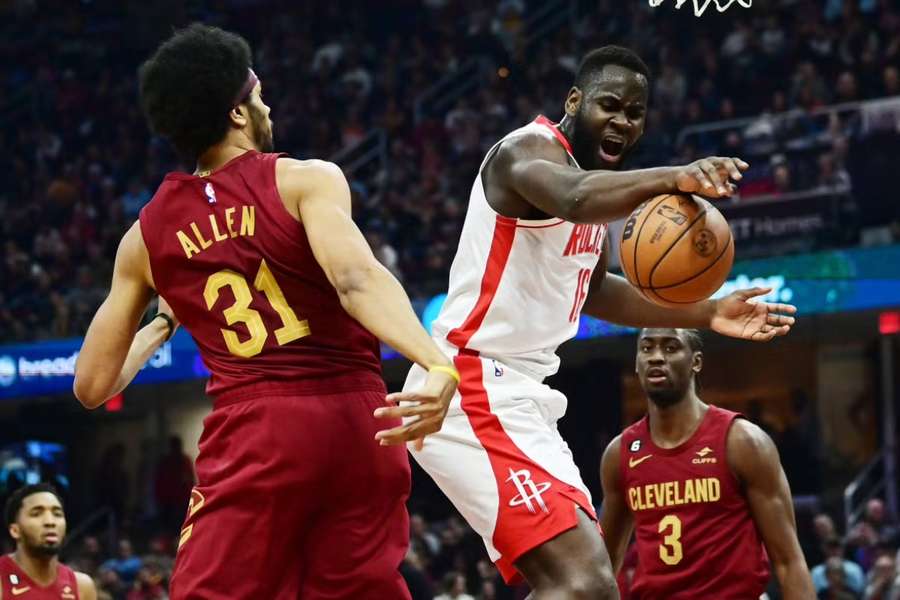 Rockets forward Garuba loses the ball as he drives against Cavaliers centre Allen