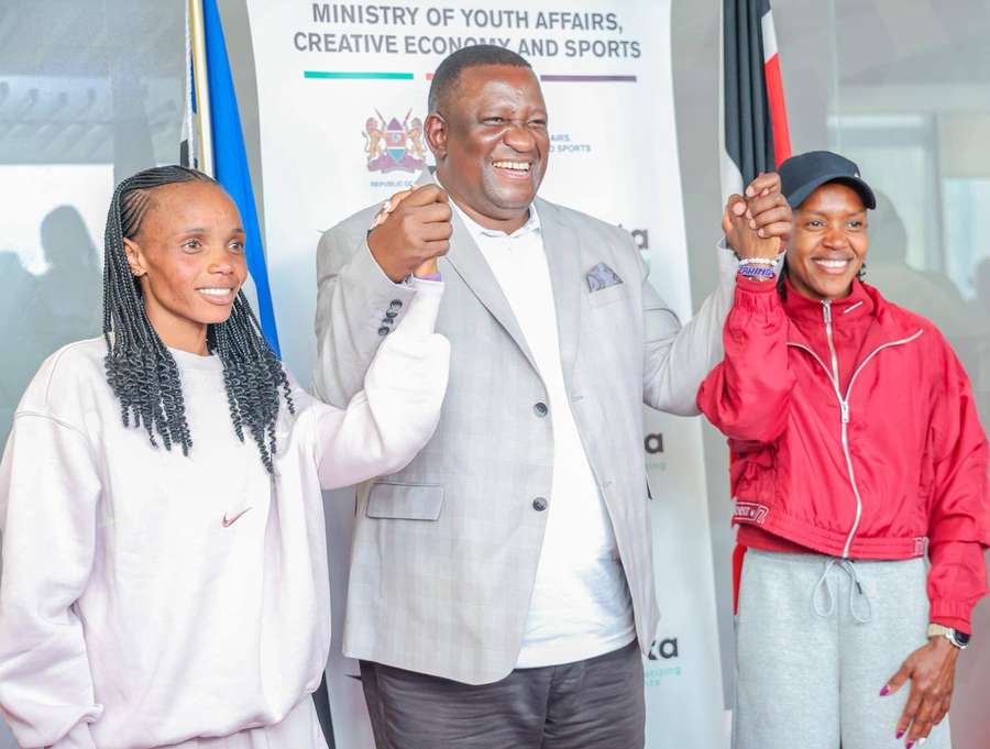 Kenya Sports Cs Salim Mvurya with Beatrice Chebet and Faith Kipyegon (right)