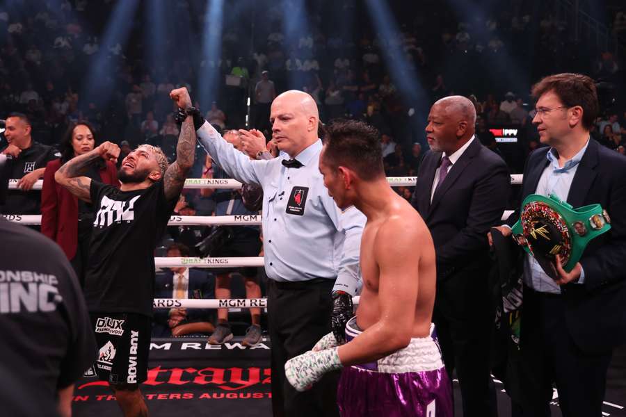 Alexandro Santiago celebrates after defeating Nonito Donaire in the WBC World Bantamweight Championship bout