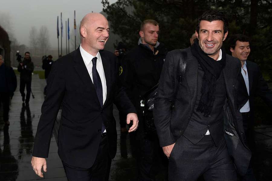 Luis Figo (R) alongside FIFA president Gianni Infantino at the FIFA headquarters three days after Infantino's election Luis Figo (R) alongside FIFA president Gianni Infantino at the FIFA headquarters three days after Infantino's election