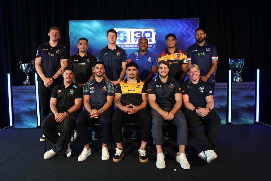 Super Rugby players pose at a special season launch in New Zealand.