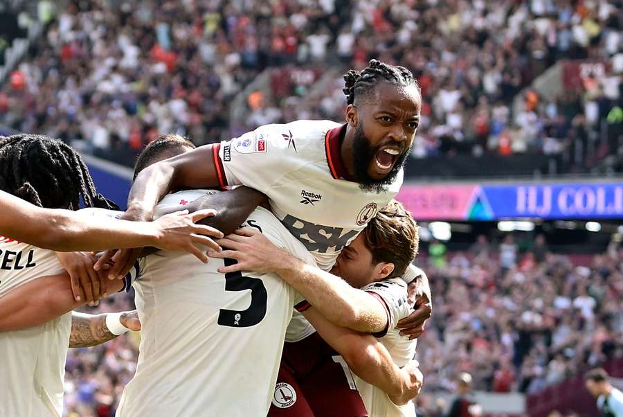 Charlton celebrate at the London Stadium Charlton celebrate at the London Stadium