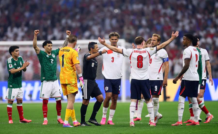 England's Jarell Quansah is shown a red card by referee Alireza Faghani after a VAR review