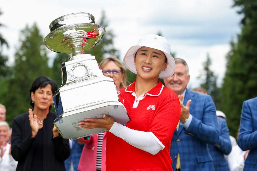 Yang celebrates after her win