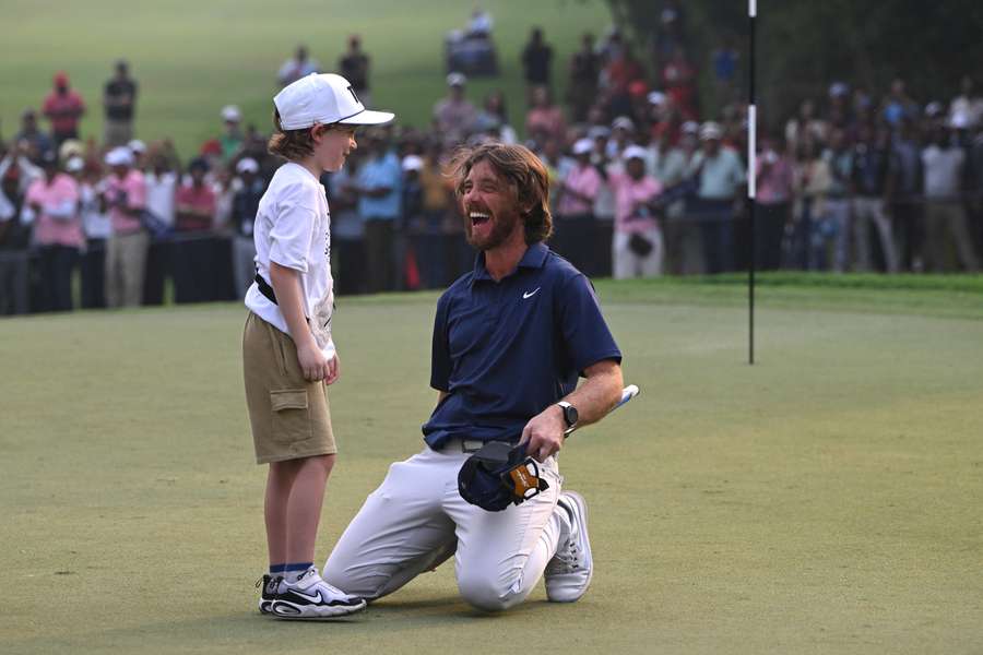 Fleetwood celebrates with his son Fleetwood celebrates with his son