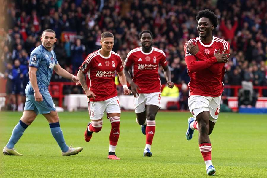 Nottingham Forest's Ola Aina (right) celebrates scoring their side's first goal 