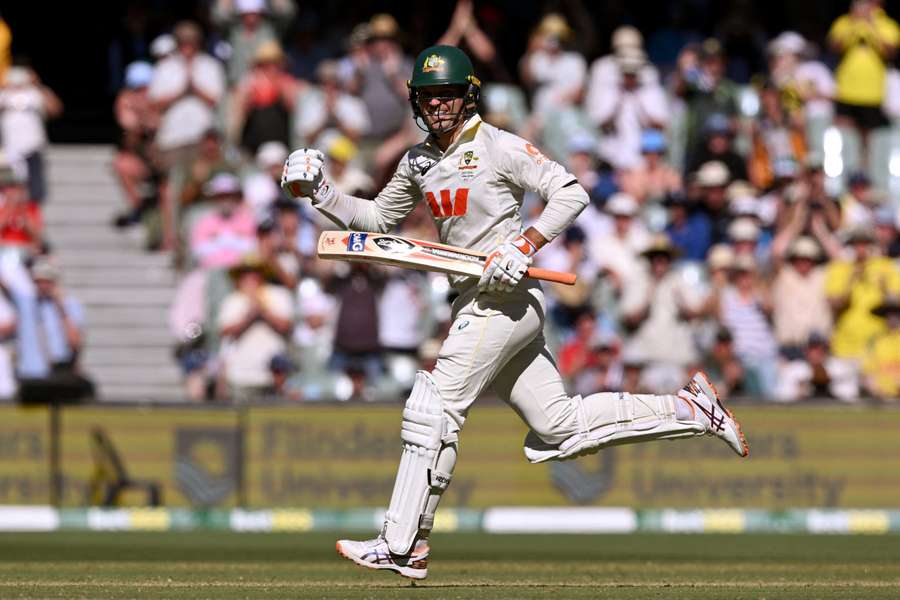 Alex Carey celebrates his maiden Ashes century in Adelaide on Wednesday.