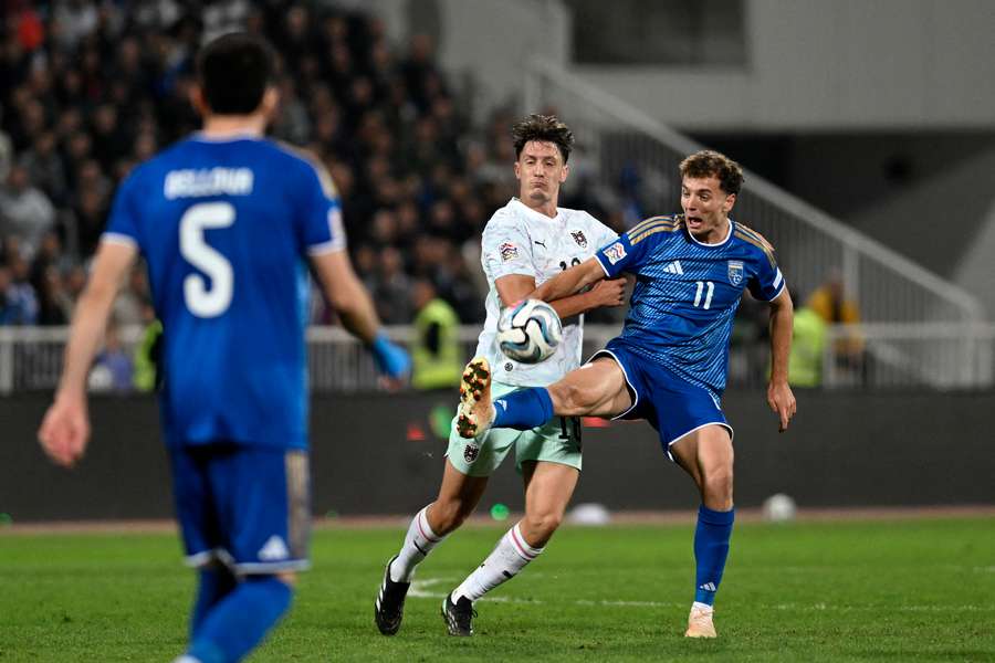 Kosovo and Austria battle for possession Kosovo and Austria battle for possession