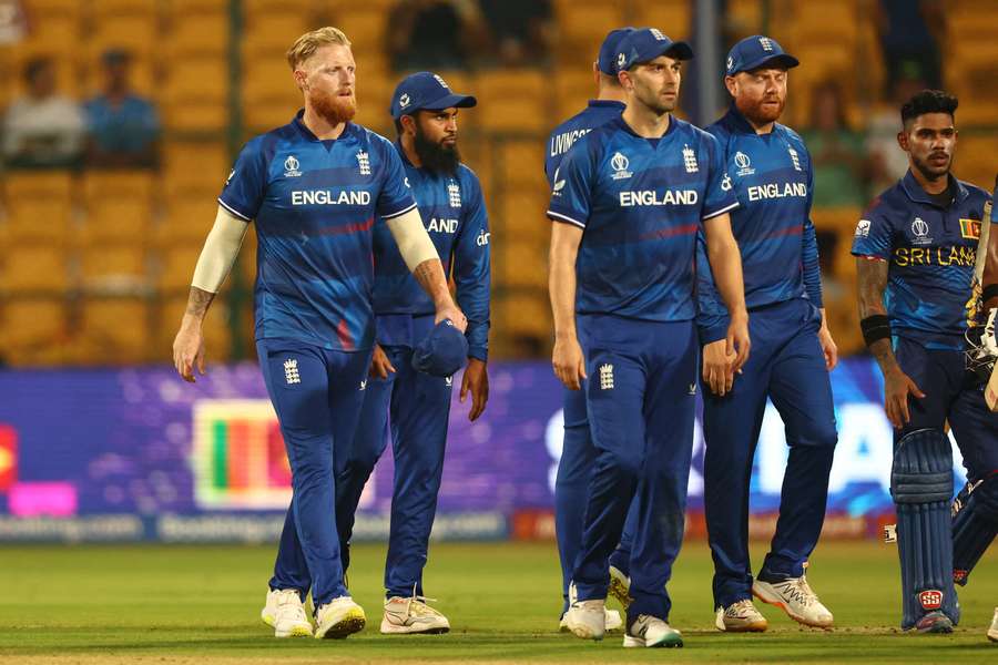 A dejected England side leave the pitch in Bengaluru after being defeated Sri Lanka