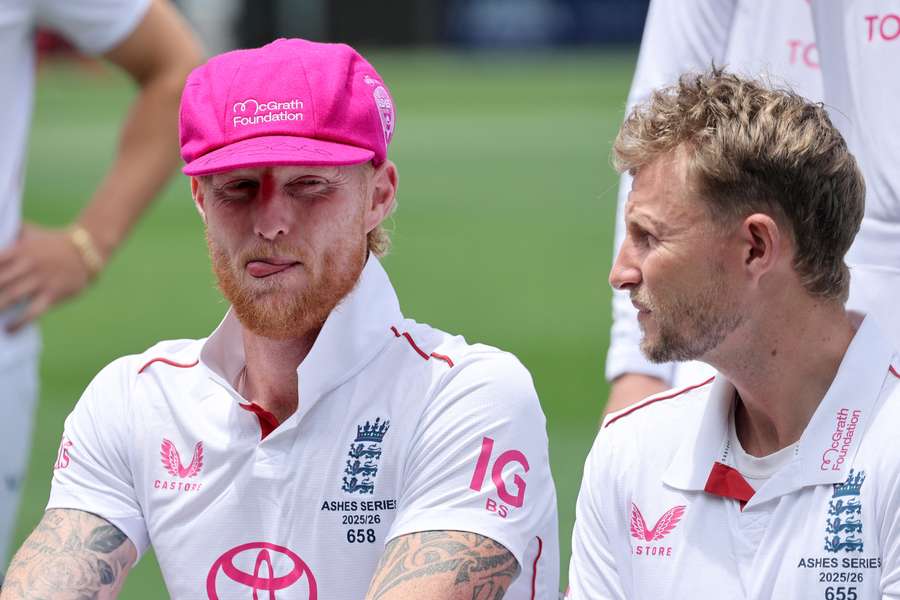 England captain Ben Stokes (L) and Joe Root (R) during a team photograph at the Sydney Cricket Ground