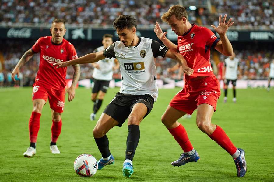 Andre Almeida protects the ball 