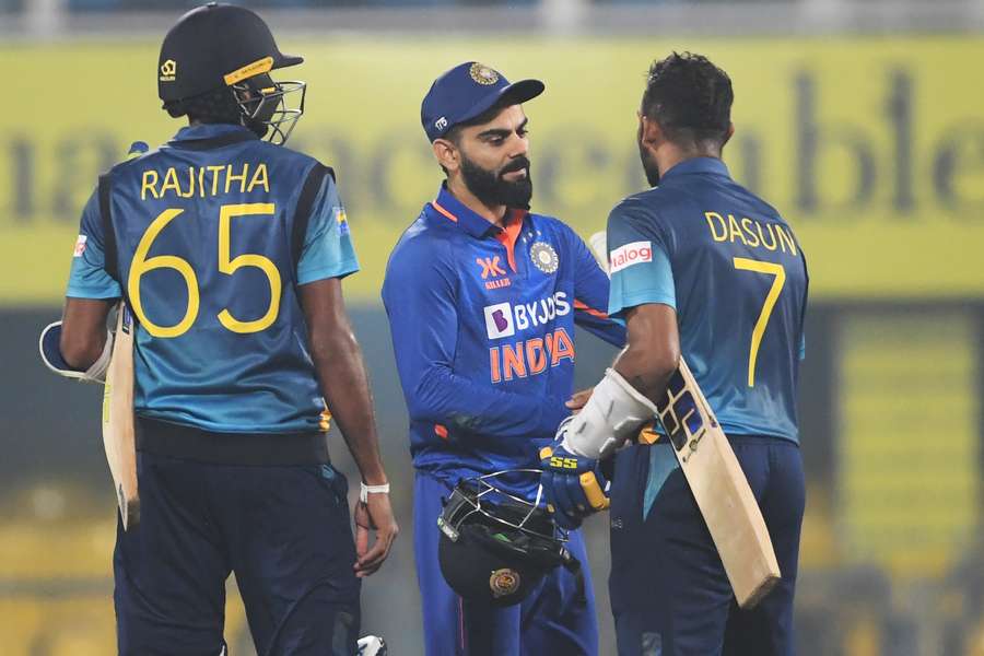 India's Virat Kohli congratulates Sri Lanka's captain Dasun Shanaka for his century 