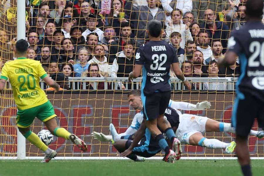 Remy Cabella scores