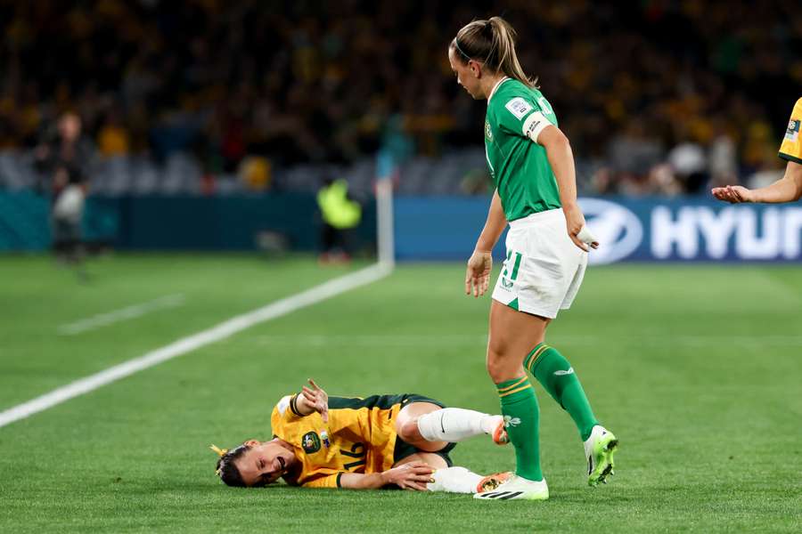 Hayley Raso reacts after clashing with Ireland's Katie McCabe