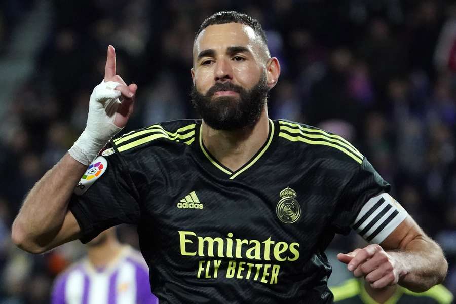 French forward Karim Benzema celebrates scoring the opening goal from the penalty spot 