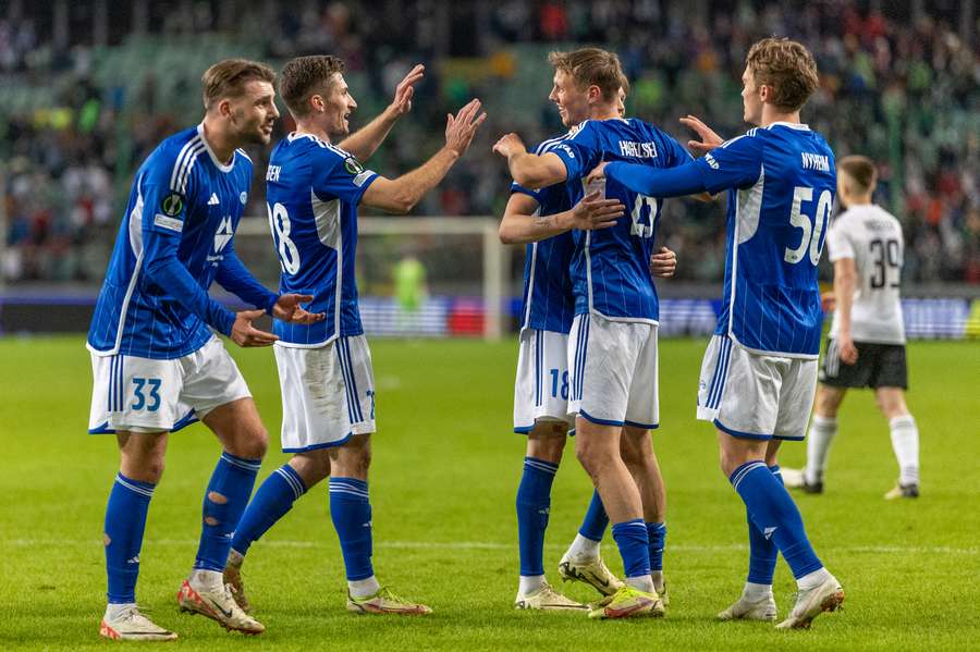 Molde players celebrate a goal during their Conference League win over Legia Warszawa