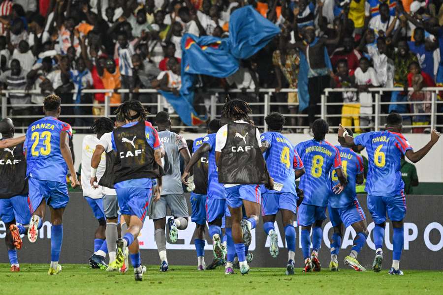 D.R. Congo celebrate their penalty shootout win 