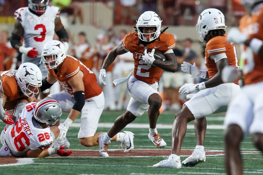 Texas running back Hollywood Smothers carries the ball during Ohio State matchup Texas running back Hollywood Smothers carries the ball during Ohio State matchup