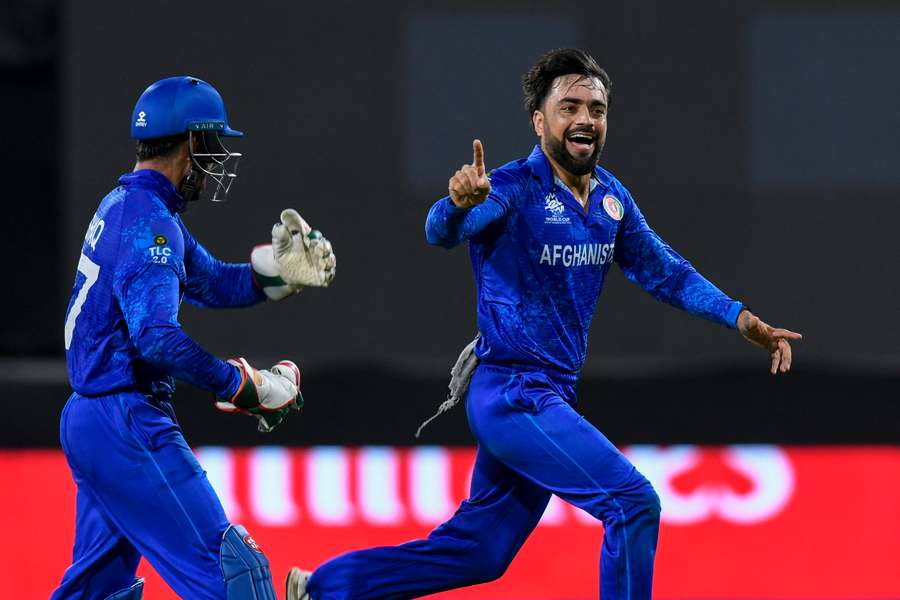 Afghanistan's captain Rashid Khan celebrates the dismissal of Bangladesh's Soumya Sarkar