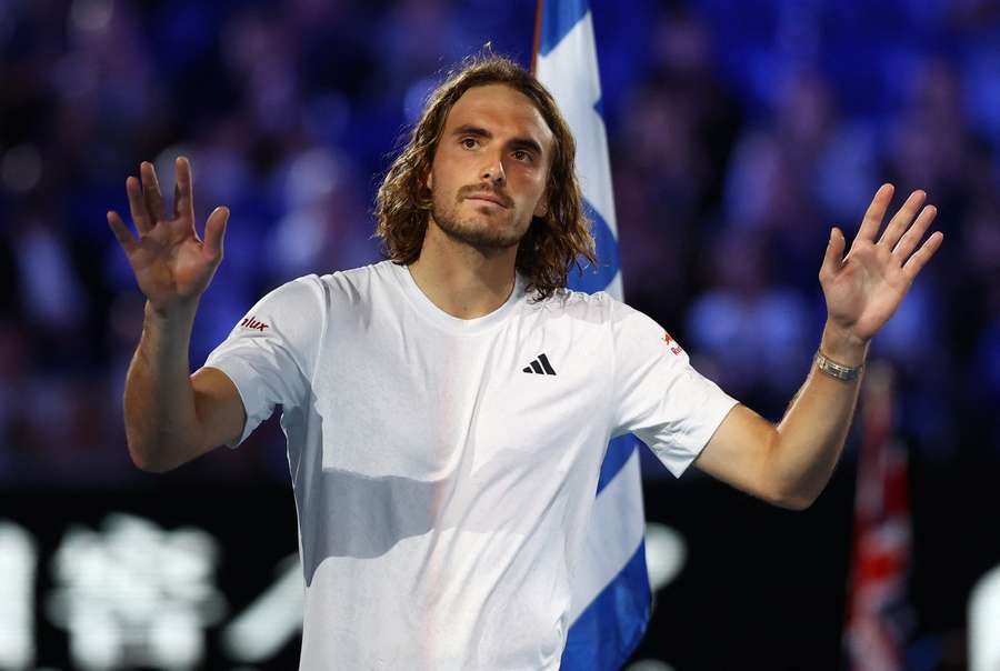 Tsitsipas salutes the crowd after his defeat to Djokovic