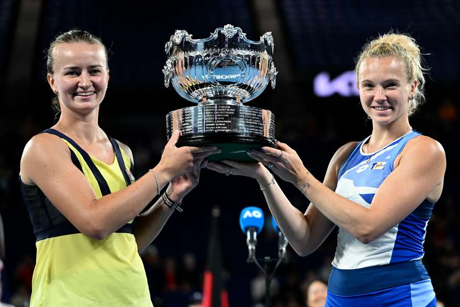 Czech Republic's Barbora Krejcikova and Katerina Siniakova lift the winners' trophy after defeating Japan's Shuko Aoyama and Ena Shibahara