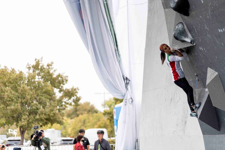 A handout picture provided by the International Federation of Sport Climbing (IFSC) shows Iranian climber Elnaz Rekabi wearing a bandana