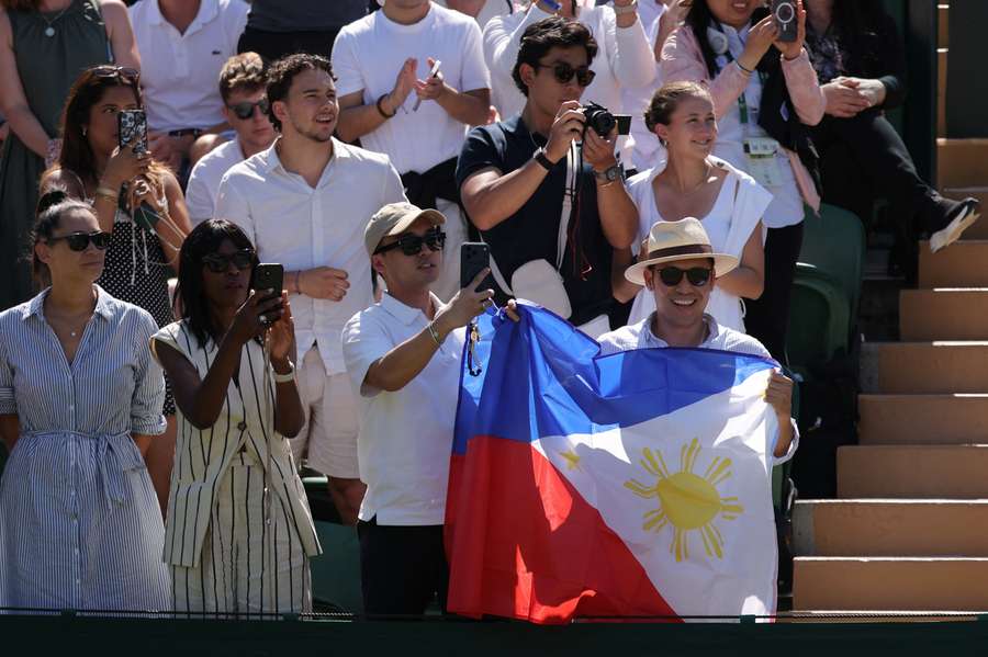 Fans in the stand during her win