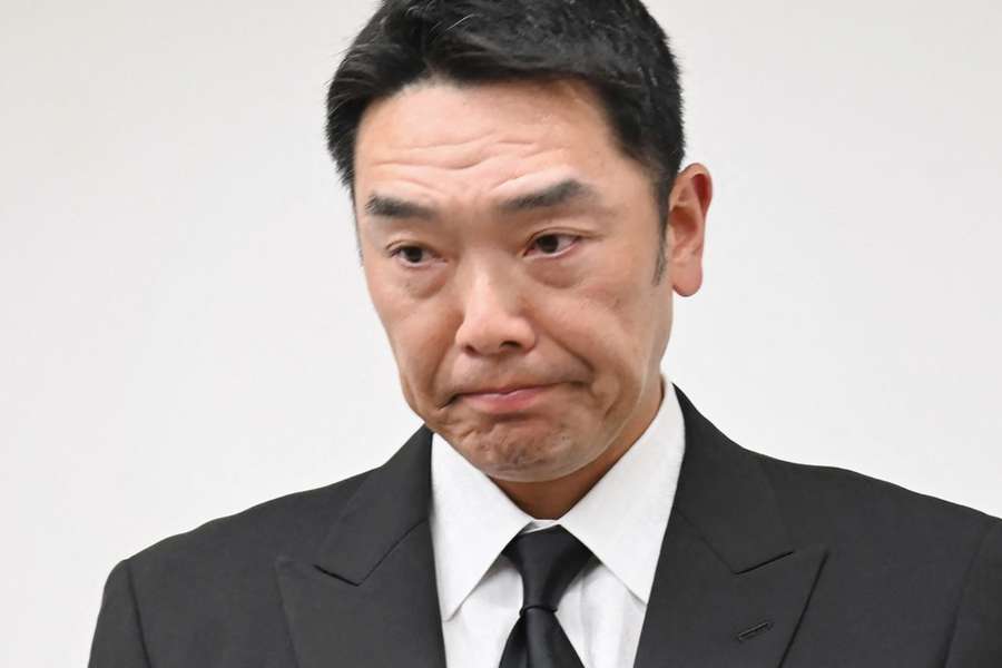 Shinnosuke Abe, manager of the Yomiuri Giants, one of Japan's most popular baseball teams, takes part in a news conference