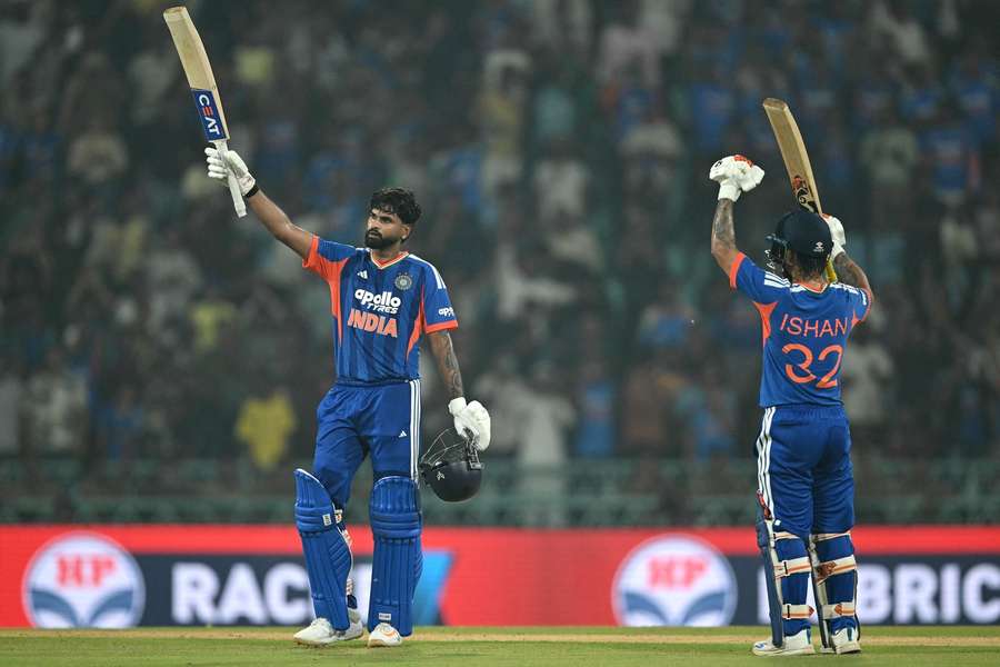 India's captain Shreyas Iyer (L) celebrates after scoring his century India's captain Shreyas Iyer (L) celebrates after scoring his century