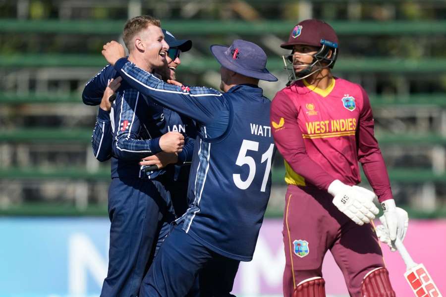 The two-time champions slumped to a seven-wicket thumping by Scotland 