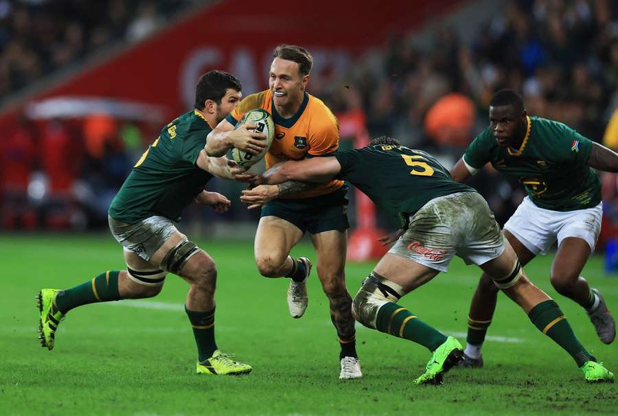 Australia's Corey Toole in action with South Africa's Ruan Nortje Australia's Corey Toole in action with South Africa's Ruan Nortje