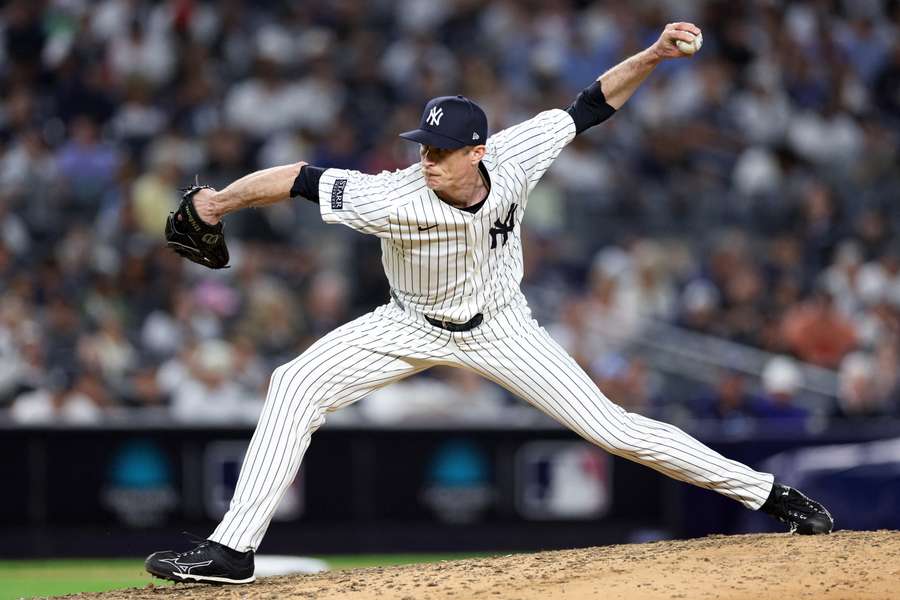 Relief pitcher Tim Hill returns to the New York Yankees on a one-year ...