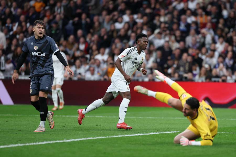 Vinicius Junior (centre) celebrates scoring for Real Madrid