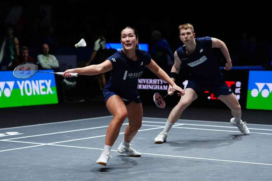 Denmark's Rasmus Espersen and Amalie Cecile Kudsk during their mixed doubles match against Malaysia's Chen Tang Jie and Toh Ee Wei 