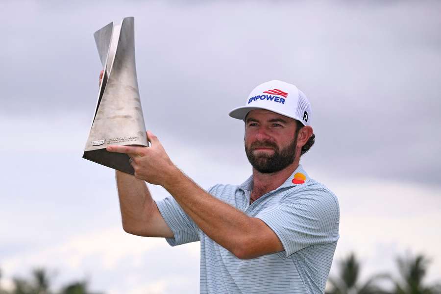 Cameron Young with his trophy