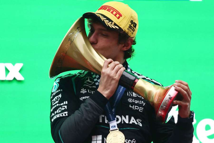 Kimi Antonelli celebrates on the podium after winning the Chinese Grand Prix Kimi Antonelli celebrates on the podium after winning the Chinese Grand Prix