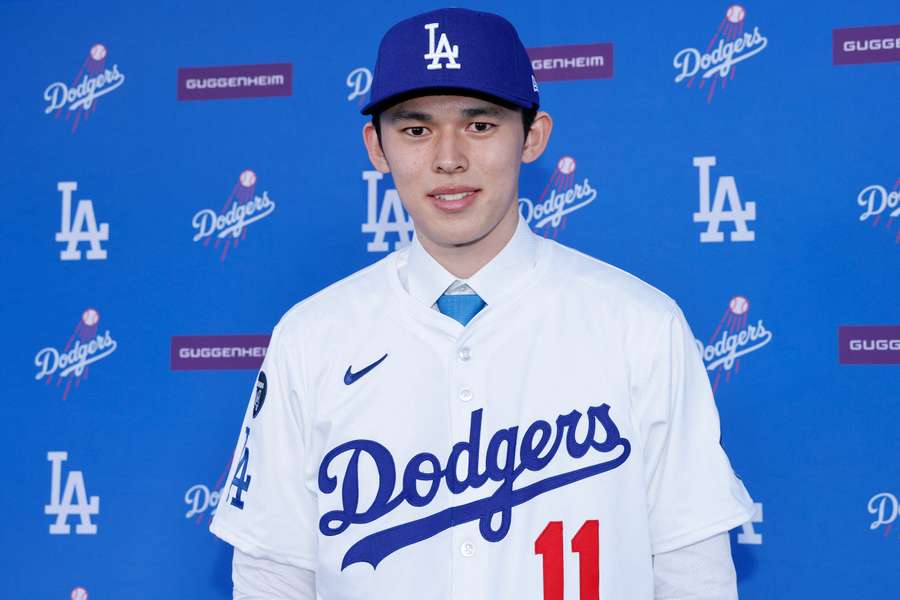 Roki Sasaki signs as new Los Angeles Dodgers pitcher.